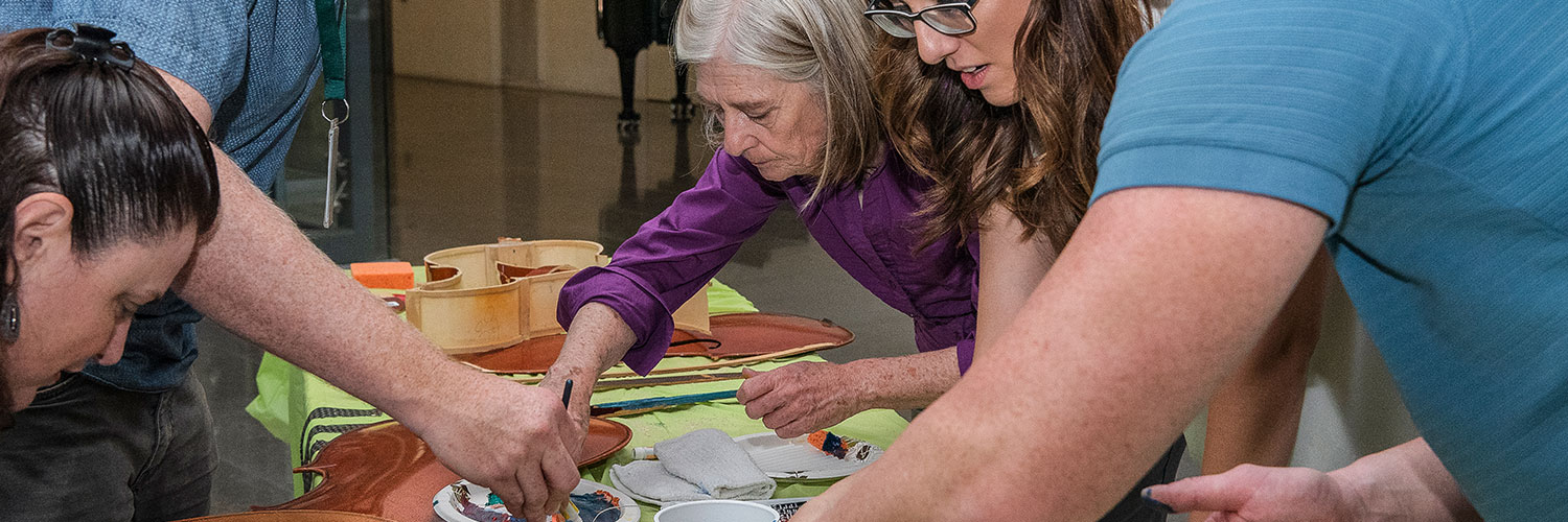 adults participating in a creative museum workshop